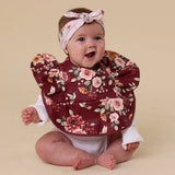 FLORAL FLUTTER WATERPROOF FRILL BIB